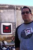 Scott with EZLN banner in the background
