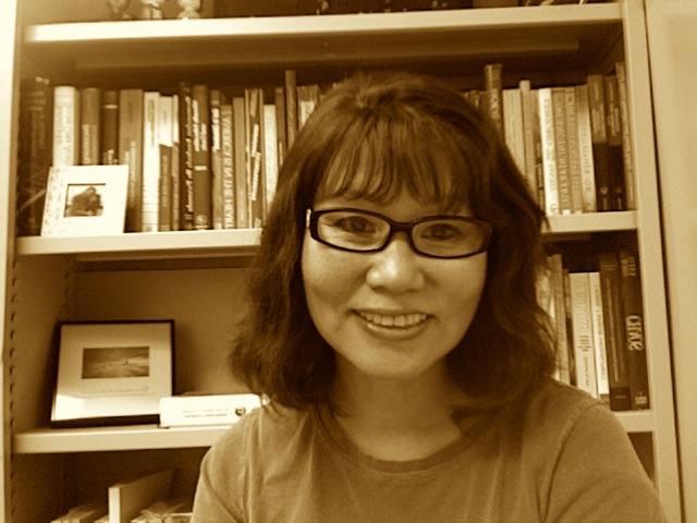 Dr. Shrake, smiling.