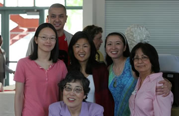 Laura Uba (seated) with AAS faculty