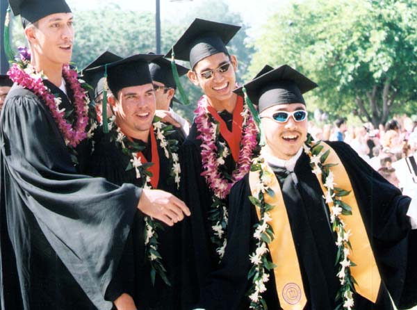 Guys looking cool for graduation photo