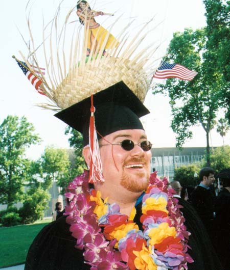 Happy graduate with crazy hat