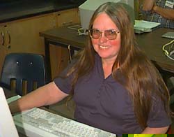 photo of Donna Hardy composing her 
first Web page in 1996