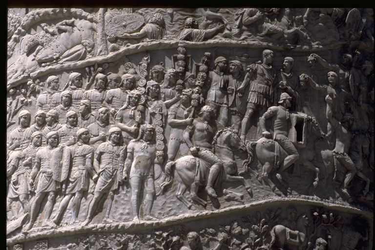 Section of Trajan's Column in Rome, showing the Emperor Trajan before an assembly of his army, cavalry soldiers riding past him