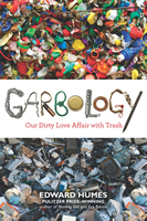 Cover shows the title and author against background photos of huge piles of garbage