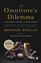 Cover of "The Omnivore's Dilemma": grapes, an egg, a bone, and a mushroom.