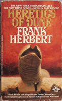 A lone figure appears to summon a gigantic sandworm in a desert landscape dominated by fiery orange clouds.