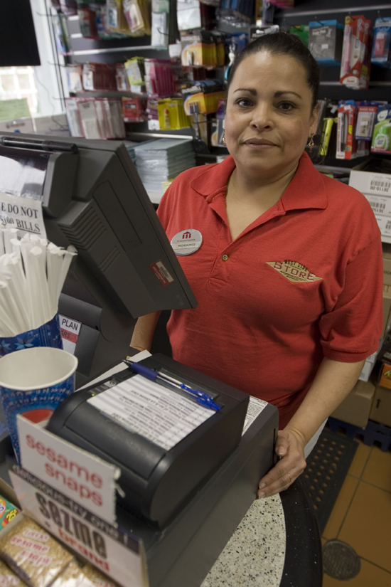 woman behind cash register