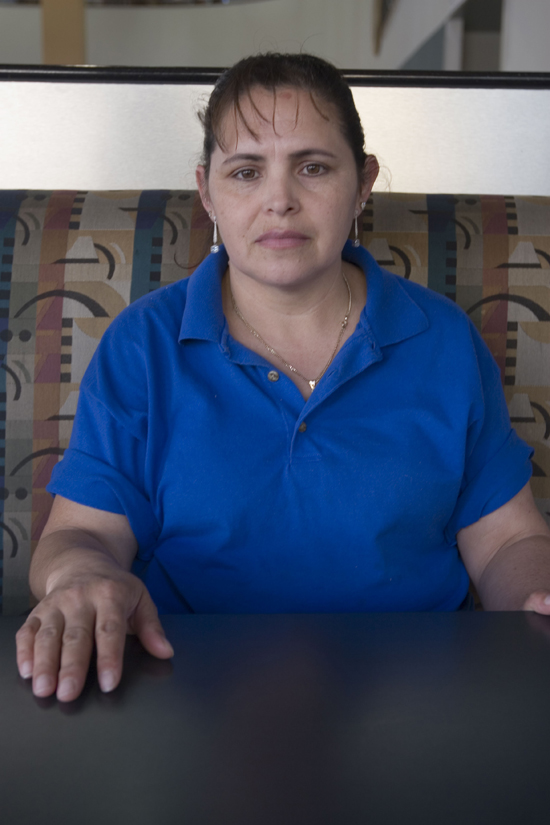 woman sitting and looking at camera