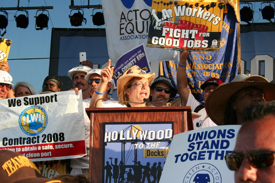 woman screaming behind podium