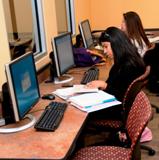 Students at the computers in the Barbara Ann Ward LAnguage Center