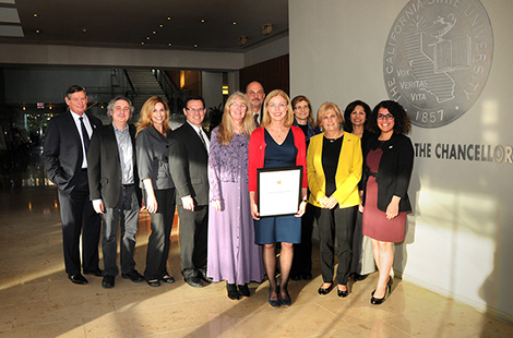 President Dianne F. Harrison and other officials