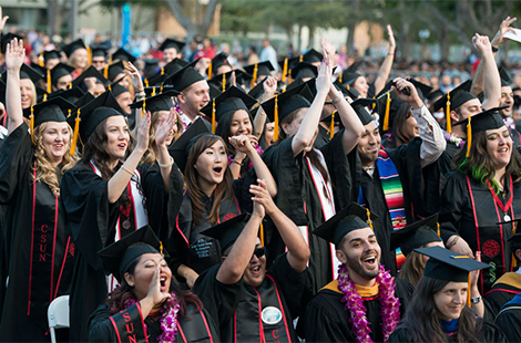 students celebrating at commencement