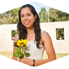 CSUN student Frida Herrera holding flower.