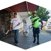 Volunteers help clean up Reseda Boulevard.