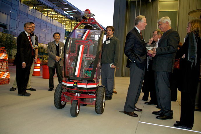 Engineering and Computer Science Dean S. Ramesh, Dr. C. T. Lin, Vice President Vance Peterson and George Leis ’81 with students, the Intelligent Ground Vehicle and other volunteer leaders. Taken at the Inaugural Volunteer Leadership Summit.