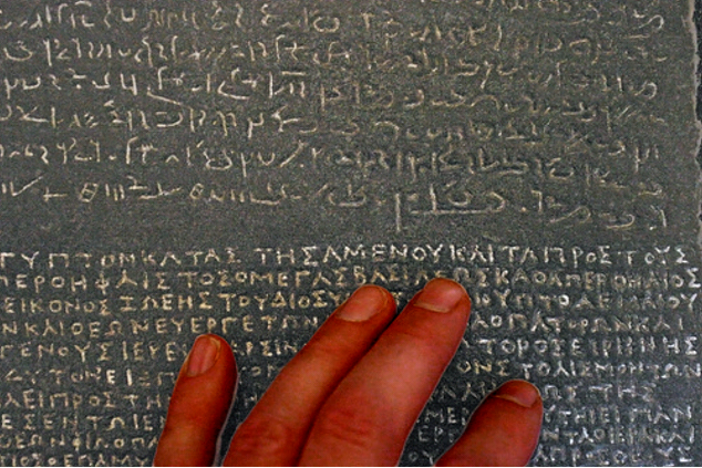 hand on Rosetta Stone