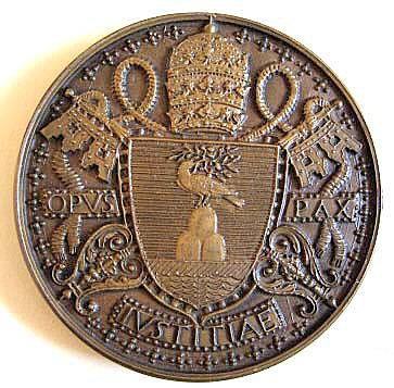 Papal coat of arms, surmounted by the Tiara.