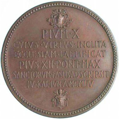 Inscription commemorating the canonization of Pius X.