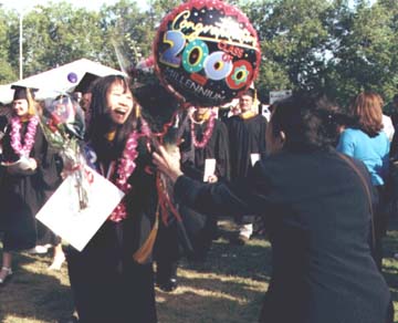 Happy Graduate with Balloon