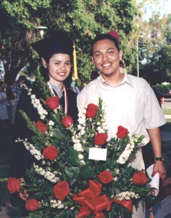 Graduate and Bouquet of Roses