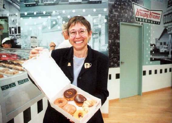 President Koester with doughnuts