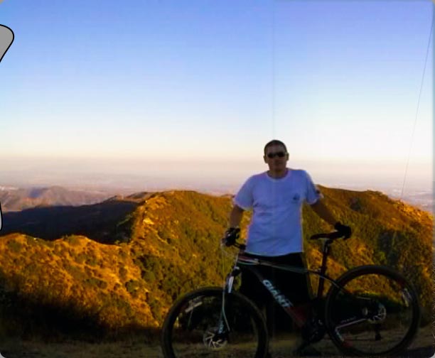 Alex at the top of the mountain