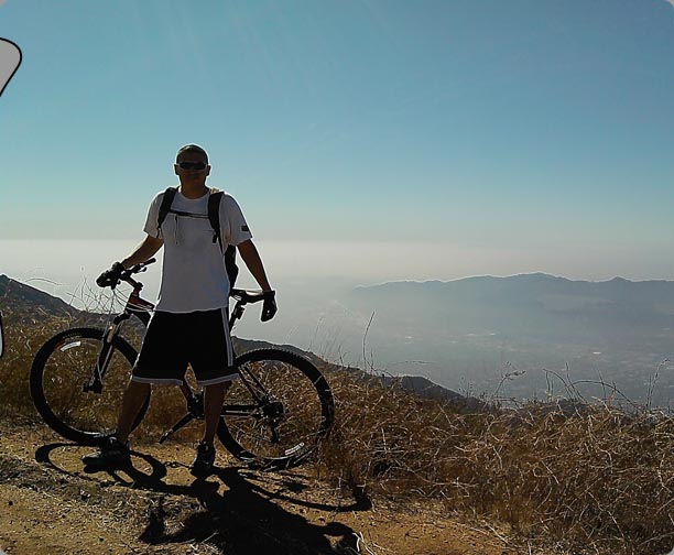 Alex at the top of the mountain