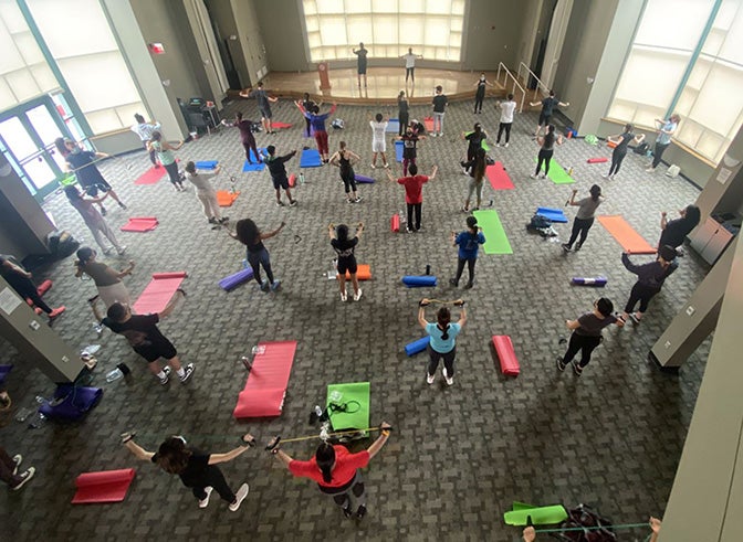 students on exercise mats