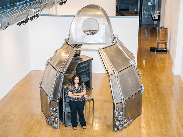 Beatriz Cortez with her hand-welded “Memory Insertion Capsule”