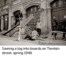 Sawing a log into boards on Tientsin street, spring 1946 