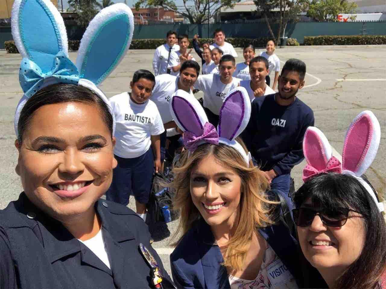 Officers and cadets dressing up with Easter rabbit ears