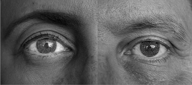 2.	Black and white close-up photo of two eyes, including eyebrows and upper bridge of the nose. Image has a seam down the middle. The eye on the left has white Hindu text paced over the iris, the right eye has white Hebrew text on the iris.