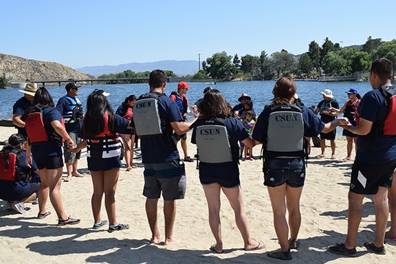 Aquatic Center Manager leads Stansport Campount participants in boating safey lesson