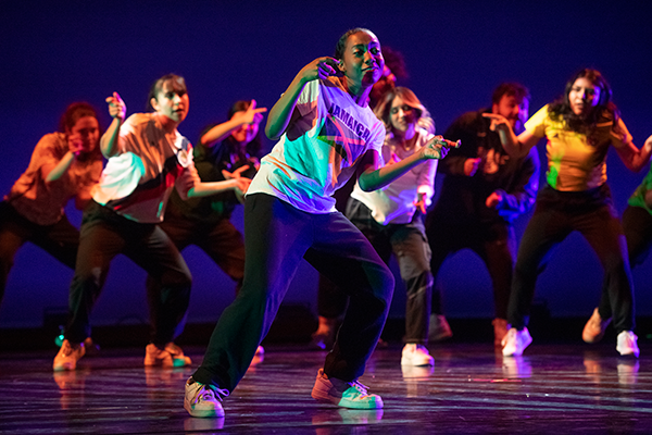 A group of dancers on a stage