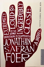 Cover of book shows red hand with text repeating the title and author.