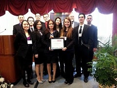 Photo of team with award