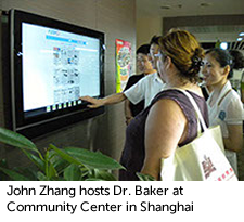 John Zhang hosts Dr. Baker at Community Center in Shanghai