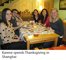 Karene eating Thanksgiving dinner in Shanghai with friends