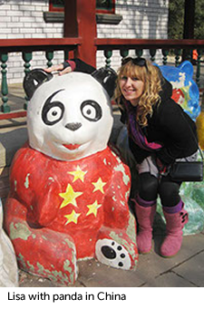 Lisa Farber with panda statue