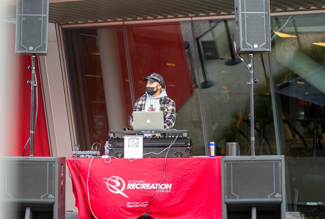 A DJ performs at the SRC@10 event