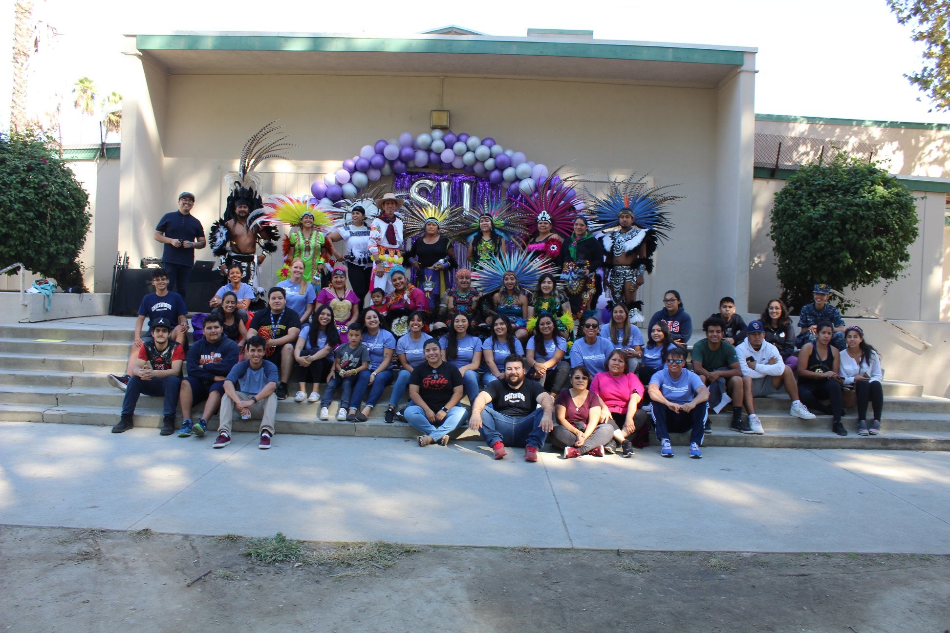 People posing for a group picture during DVAM 2019