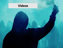Person holding a smoke flare with Videos label