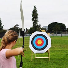 student takes aim at target