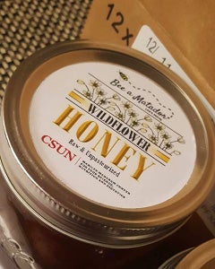 top of a jar of bee a matador wildflower honey