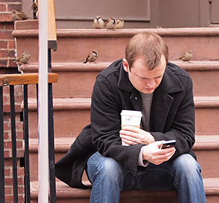 A man using a smartphone. 