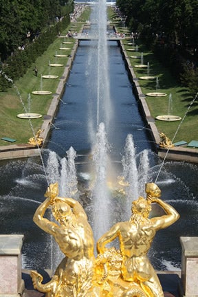 fountain with gold statues