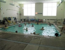 center of achievement clients in aquatic group exercise
