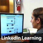 A woman using a computer representing 'LinkedIn Learning'. 