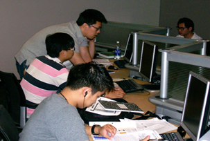 Mechanical Engineering Lab Students Studying