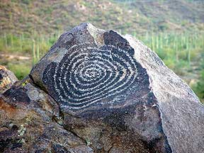spiral petroglyph on rock, Arroyo Hondo, New Mexico